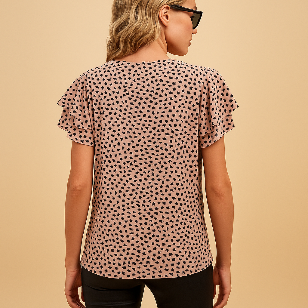 Stijlvolle top voor dames met opvallende print en elegante pasvorm, ideaal voor casual en geklede gelegenheden.